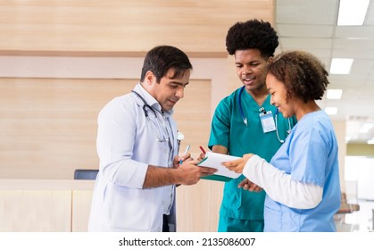 Team of diversity doctor and nurse is discussing and brainstorming on patient medical record after diagnosis for precise care plan with experienced senior physician specialist - Powered by Shutterstock