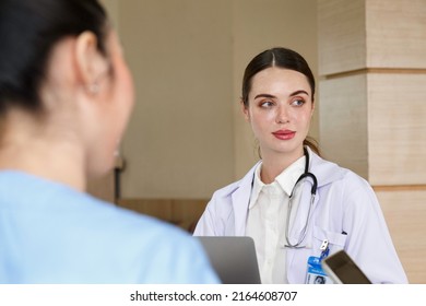 Team Doctor, Nurse And Internship Doctor Talking And Discussing About Surgery Treatment Patientâ€™s Case While Sitting In The Meeting Room Office In Hospital. Healthcare And Medical Concept.