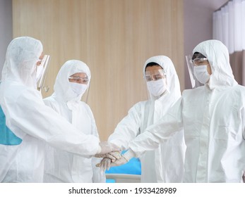 Team Of Doctor And Nurse Wear Personal Pretective Equipment Or Ppe In Hospital. For For Treatment Health Care Covid-19 Corona Virus Disease Medical Protection Concept.