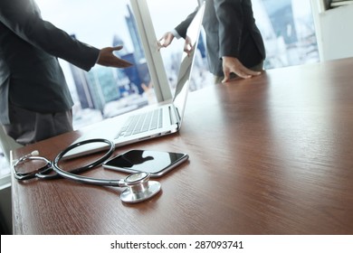 team doctor working with laptop computer in medical workspace office and medical network media diagram as concept