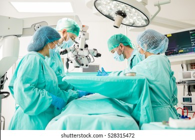 Team Of Doctors Concentrating On A Patient During A Heart Surgery At A Hospital
