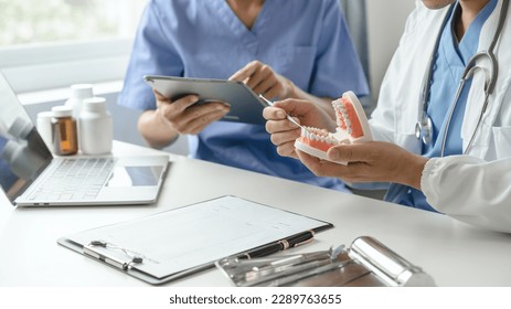 Team of doctors and dentists talking and working health care talk medical conference concept online consultant - Powered by Shutterstock