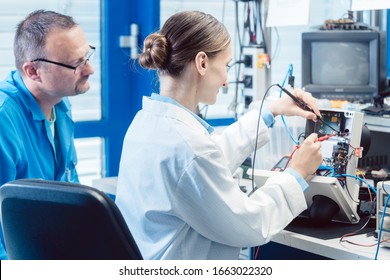 Team Electronic Engineers Testing Product Prototype Stock Photo ...