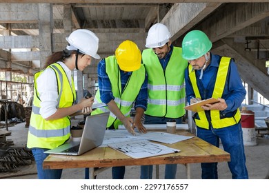 Team of engineer, architect, contractor and foreman meeting and consulting at construction building site with floor plan for real estate development project industry and housing timeline