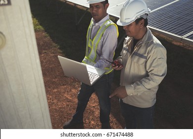 Team engineers checking solar cells. Solar cells have been maintained and maintenance by a team of engineers.