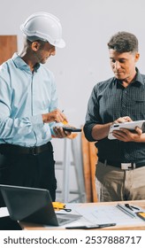 Team Engineers with draft plan of building on constructing site. Engineer work on site. engineer visit and inspection site engineer. Inspector engineer check and working on site.