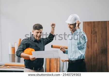 Team Engineers with draft plan of building on constructing site. Engineer work on site. engineer visit and inspection site engineer. Inspector engineer check and working on site.