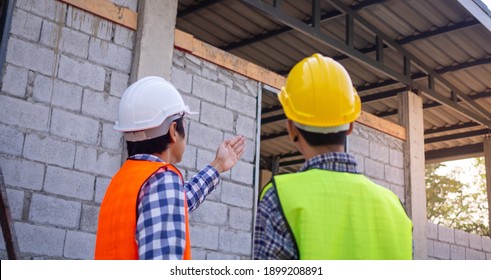 Team Of Engineers Or Inspectors Is Inspect The Structural Integrity And Construction Of The House Before Present To The Client. Check The Building Concept