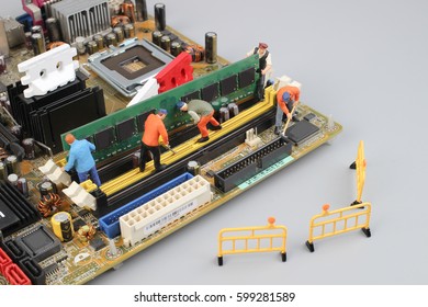 Team of engineers repairing circuit mother board