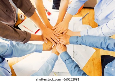 Team Of Engineers Working Together In A Architect Office.