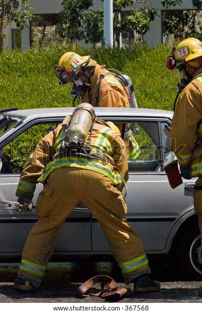 Team Firefighters Preparing Pry Open Door Stock Photo Edit