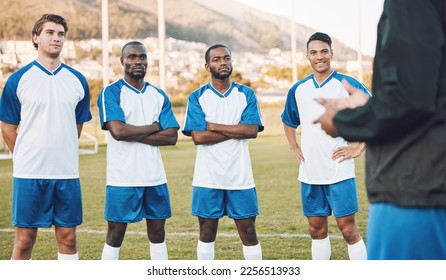 Team, football player and coaching on field for sports training, games strategy and competition planning together. Focus, leadership and man talking to soccer people or men on pitch for workout goals - Powered by Shutterstock