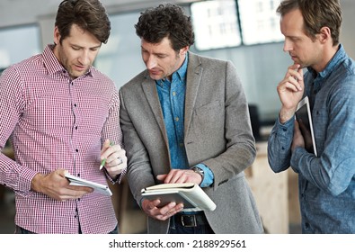 Team or group of business men talking, meeting and planning a strategy during a meeting about investment, development and growth. Discussing compliance, vision and innovation in a corporate office - Shutterstock ID 2188929561