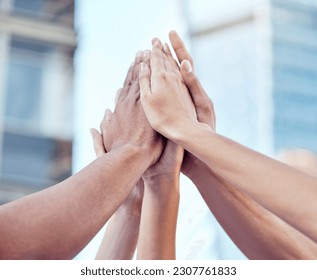 Team, high five and hands together of business people with goal and target success outdoor. Win, celebration and solidarity of staff with collaboration support and achievement with emoji hand sign - Powered by Shutterstock