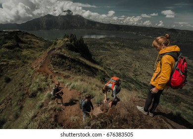 Team of hikers walking in the valley