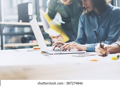 Team Job. Photo Young Businessmans Crew Working With New Startup Project In Modern Loft. Generic Design Notebook On Wood Table. Horizontal, Film Effect