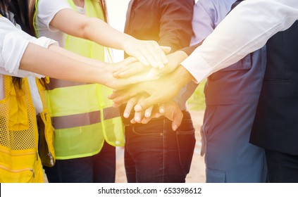 Team Job Of Teamwork Engineer Work Together In A Construction Site With Business Concept.