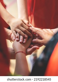 Team Of Kids Children Basketball Players Stacking Hands In The Court, Sports Team Together Holding Hands Getting Ready For The Game, Playing Indoor Basketball, Team Talk With Coach, Close Up Of Hands