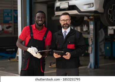 Team Maintenance Technician Female The Car Is Inspecting And Working On The Engine. Engineer, Professional Technician, Automobile Manufacturing Industry, Quality Standards, Consumer Market