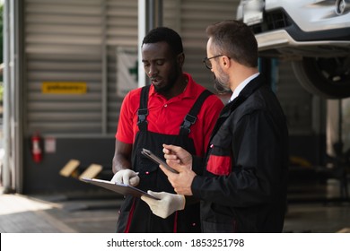 Team Maintenance Technician Female The Car Is Inspecting And Working On The Engine. Engineer, Professional Technician, Automobile Manufacturing Industry, Quality Standards, Consumer Market