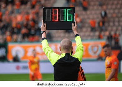 Team manager man shows players substitution during football match. - Powered by Shutterstock