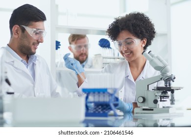 Team of Medical Research Scientists Working on Generation Experimental Drug - Shutterstock ID 2106461546