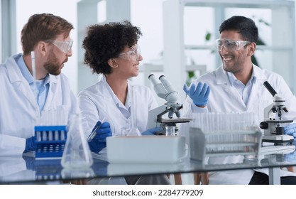 Team of Medical Research Scientists Working on Generation Experimental Drug - Powered by Shutterstock