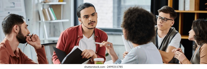 Team members share thoughts and emotions amid challenging circumstances. - Powered by Shutterstock