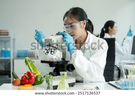 Team Microbiologists Analyzing Molecular Samples in Advanced Food Science Laboratory, Dietitian food and medicine.