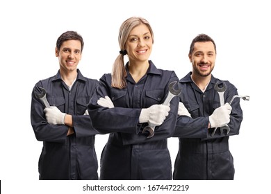 Team of a one female and two male mechanics holding working tools isolated on white background - Shutterstock ID 1674472219