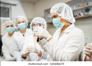 Team Of Pharmacist Working On Drug Discovery.Development Of New Vaccine.Sterile Cleanroom.Antivirus Antidote Immunization Concept.Lab Pre-clinic Experiment.Disease Biochemical Analyisis.Diagnostics