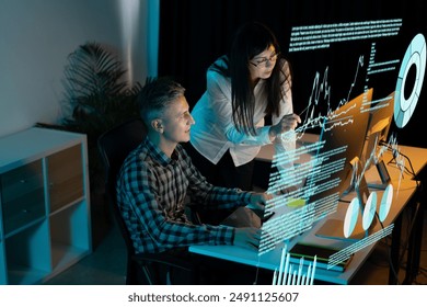 Team Of Professionals Analyzing Data On Multiple Computer Screens, Highlighting Concepts Of Technology, Business, And Collaboration. Tech, Business Analysis, And Teamwork. - Powered by Shutterstock