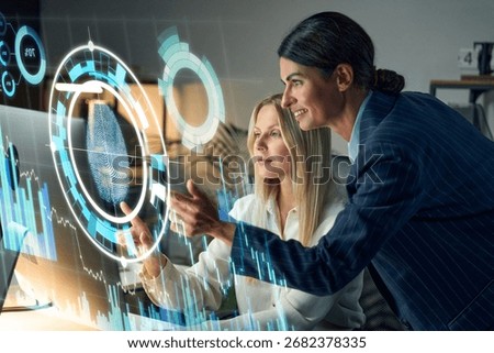 Team Of Professionals Working On Digital Interfaces, Exploring Advanced Technology And Cybersecurity Concepts, Displaying Innovation And Collaboration In A Modern Office Environment