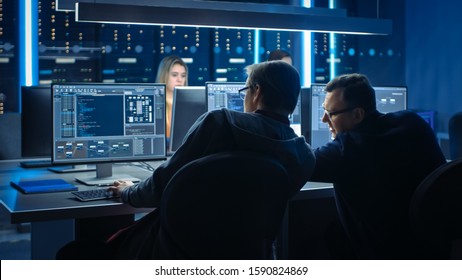 Team of IT Programers Working on Desktop Computers in Data Center Control Room. Team of Young Professionals Working In Software and Hardware Development, Doing Coding