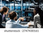 Team of programmers doing brainstorming in data center, optimizing equipment for AI tasks, increasing workloads. Coworkers cooperating in server hub, automating system diagnostics using deep learning