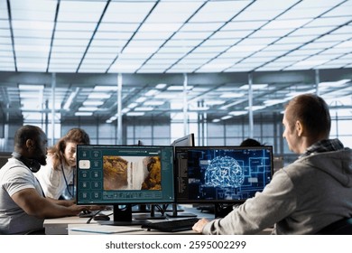 Team of programmers in server room making generative artificial intelligence website generating videos using diffusion models. Teamworking colleagues coding AI virtual assistant producing clips - Powered by Shutterstock - Get 15% off with code: PIKWIZARD15
