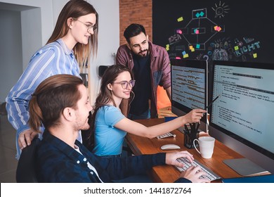 Team Of Programmers Working In Office