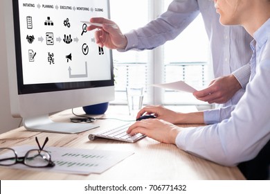 Team of project managers working on planning, strategy and management on computer screen with business administration processes - Shutterstock ID 706771432