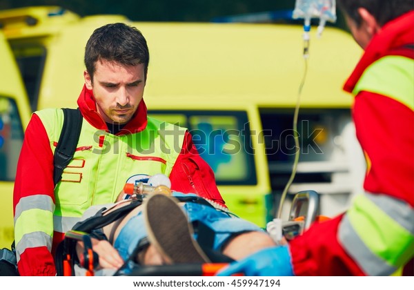 Team Rescuers Paramedic Doctor Preparing Patient Stock Photo 459947194 ...