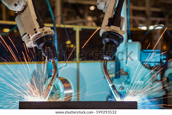 Team robot welding are test run for new program\
in car factory