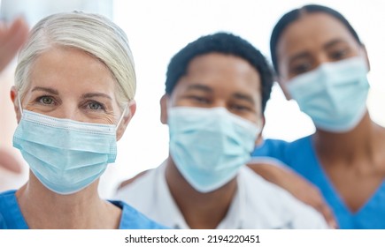 Team Selfie Of Doctors With Mask For Safety Against Covid, Corona Pandemic, Or Virus In A Hospital. Portrait Of Healthcare Employee Or Medical Workers Together For Support, Teamwork And