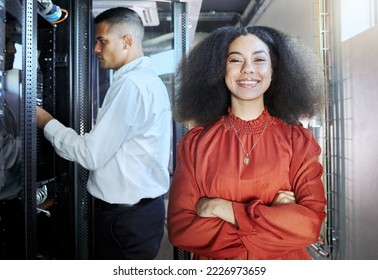Team, server room and cybersecurity and computer engineer man and woman repair hardware. Technician, datacenter and computer engineer teamwork to fix online cloud computing server and equipment