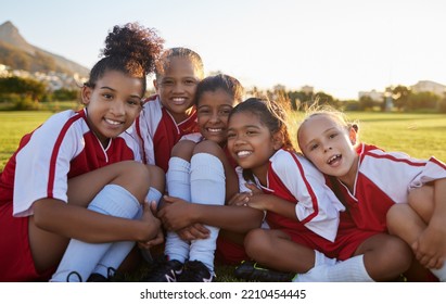 Team, soccer or happy sports girl with smile on field, grass or stadium for health, teamwork or wellness portrait. Children, football or exercise with support, diversity or motivation for sports game - Powered by Shutterstock