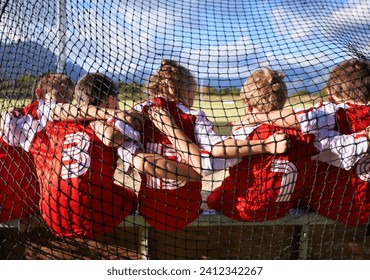 Team, soccer player and ball on goal net, back and embrace for game, field and child. Outdoor, playful and sport for childhood, portrait and athlete for match, alone and outside on football pitch - Powered by Shutterstock