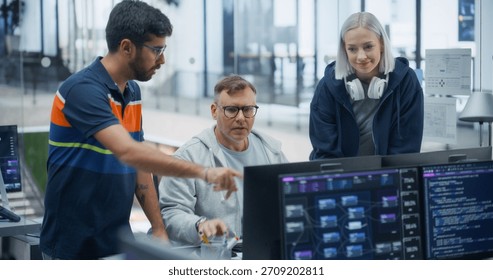 Team of Software Engineers Collaborating on Ai Project, Analyzing Code on Dual Monitors in Modern Office. Highlights Teamwork, Technical Expertise, and Innovative Software Development.
