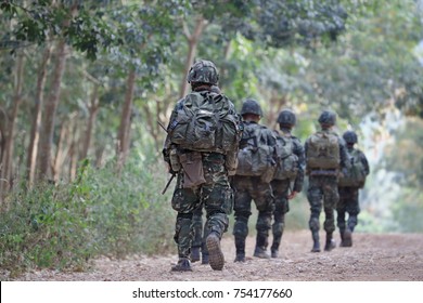 Team Of Soldiers Walking