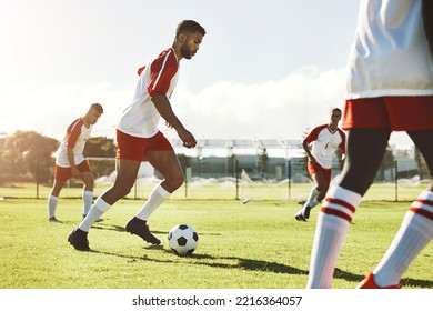 Team sports game, soccer and teamwork of men busy with football collaboration and workout. Fitness, training and healthy exercise of a healthy athlete ground with fast energy running with a ball - Powered by Shutterstock