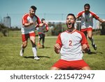 Team, success and winner by soccer player celebration during game at soccer field, happy, cheering and victory. Sport, achievement and goal by football team running and celebrating football field win