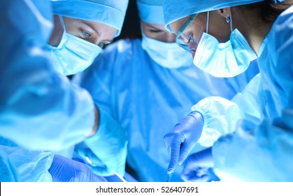 Team surgeon at work on operating in hospital