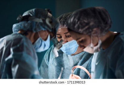 A Team Of Surgeons Fights For Life During Lung Surgery, Pneumonia And Tuberculosis, The Struggle For Life, Modern Medicine. Fight Against The Virus